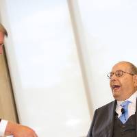 President Emeritus Tom Haas presenting Richard DeVos with a gavel.